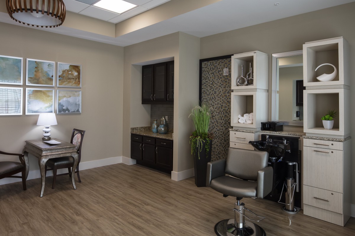 A modern salon interior featuring stylish furnishings and a relaxing atmosphere.