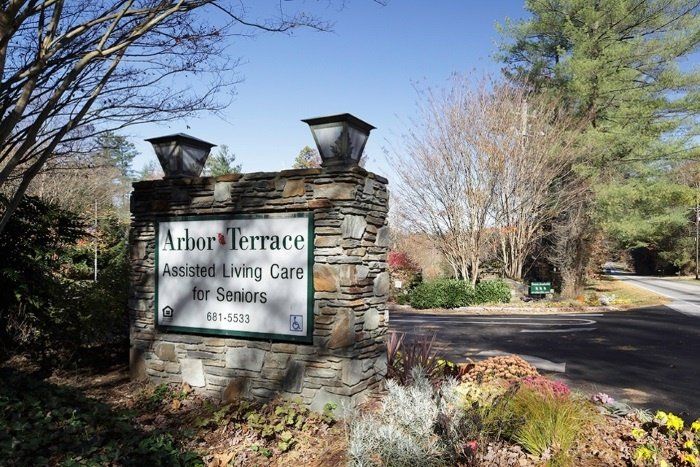 Entrance sign for Arbor Terrace Assisted Living Care for Seniors.