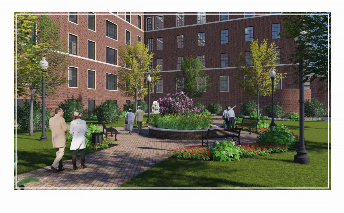 A landscaped courtyard with benches and people enjoying the greenery in an urban setting.
