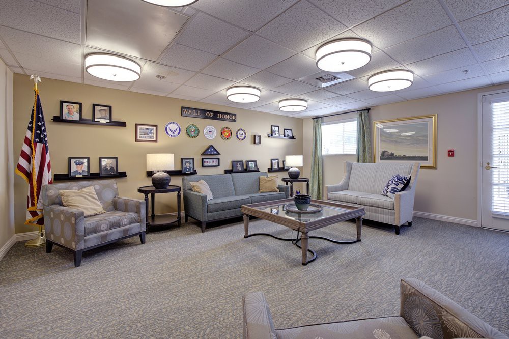 A cozy living room with modern furniture and soft lighting.