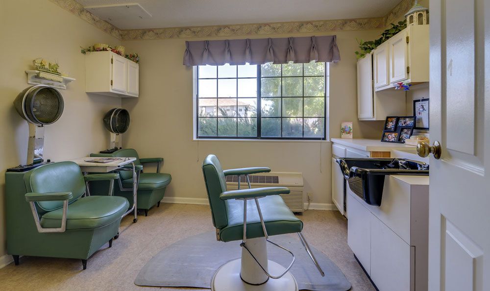 A clean and modern dental office with a comfortable dentist chair and necessary equipment.