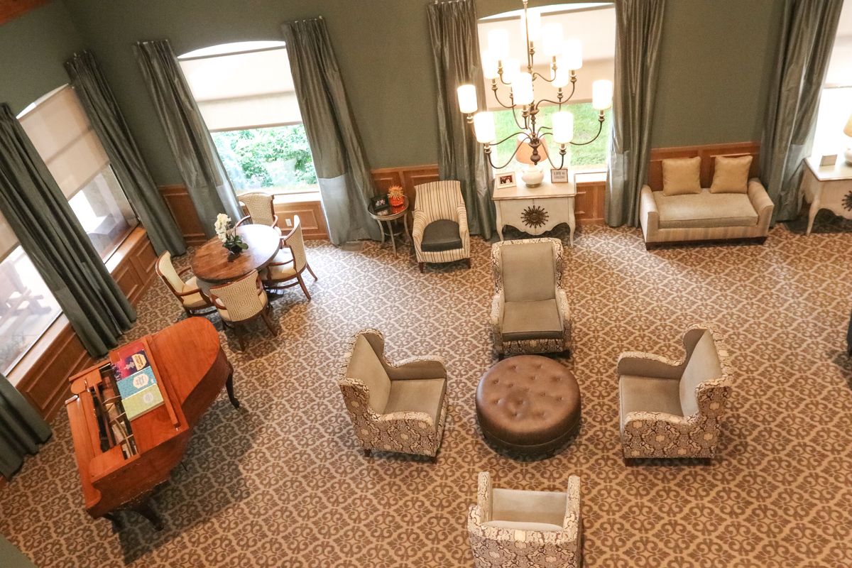 An elegant living room with comfortable seating and natural light.