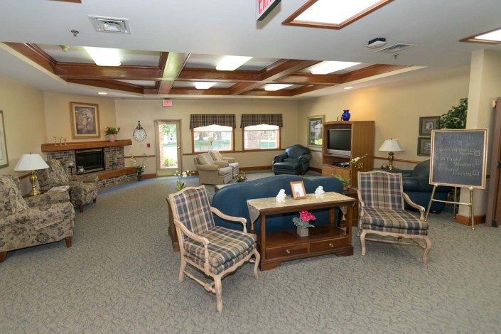 A cozy living room with comfortable seating and a television.