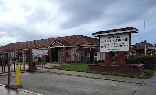 A view of a Christian community center with signage indicating its purpose.
