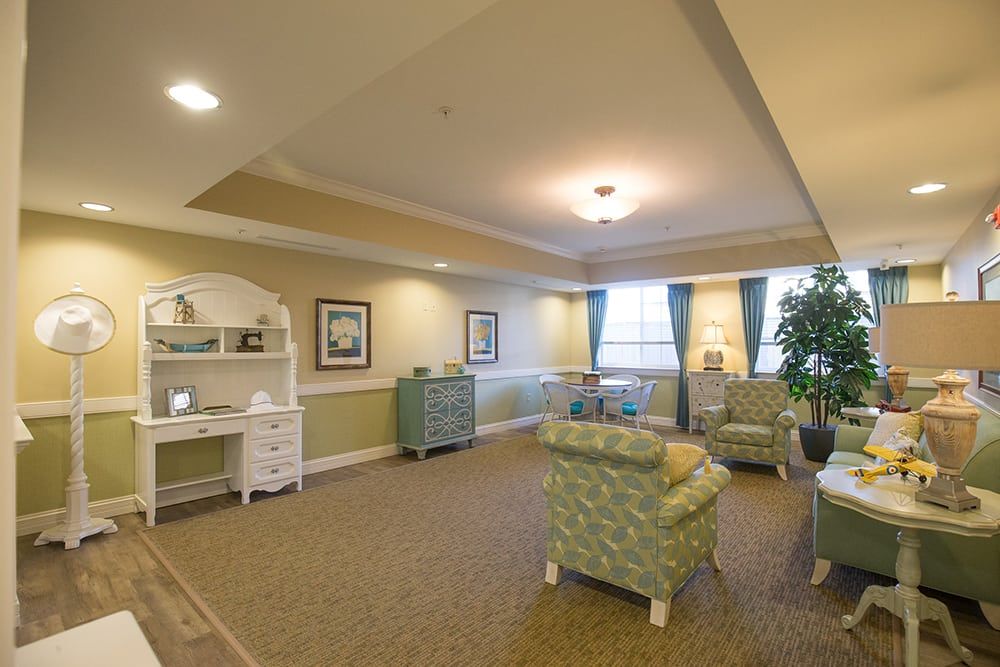 A cozy living room with comfortable seating and inviting decor.