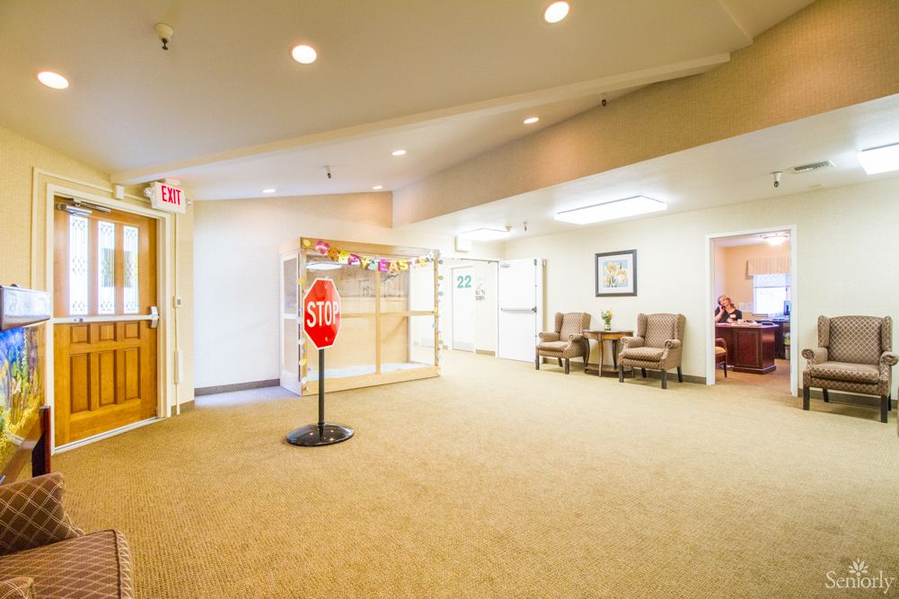 A bright, welcoming waiting area with comfortable seating and warm lighting.