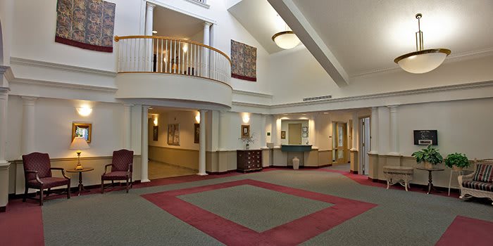 A spacious and well-lit lobby area with modern architectural features.