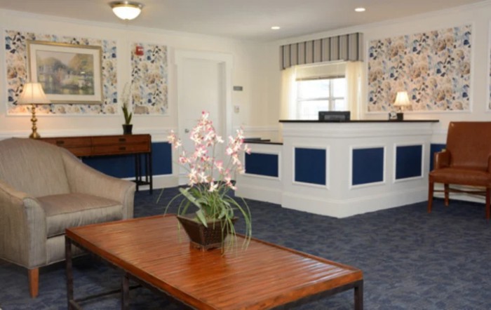 A welcoming hotel reception area with a cozy and elegant design.
