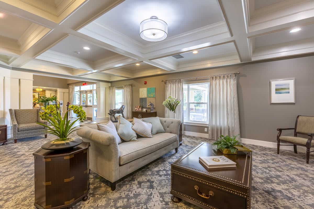 A beautifully designed living room with a comfortable sofa, stylish coffee table, and elegant decor.