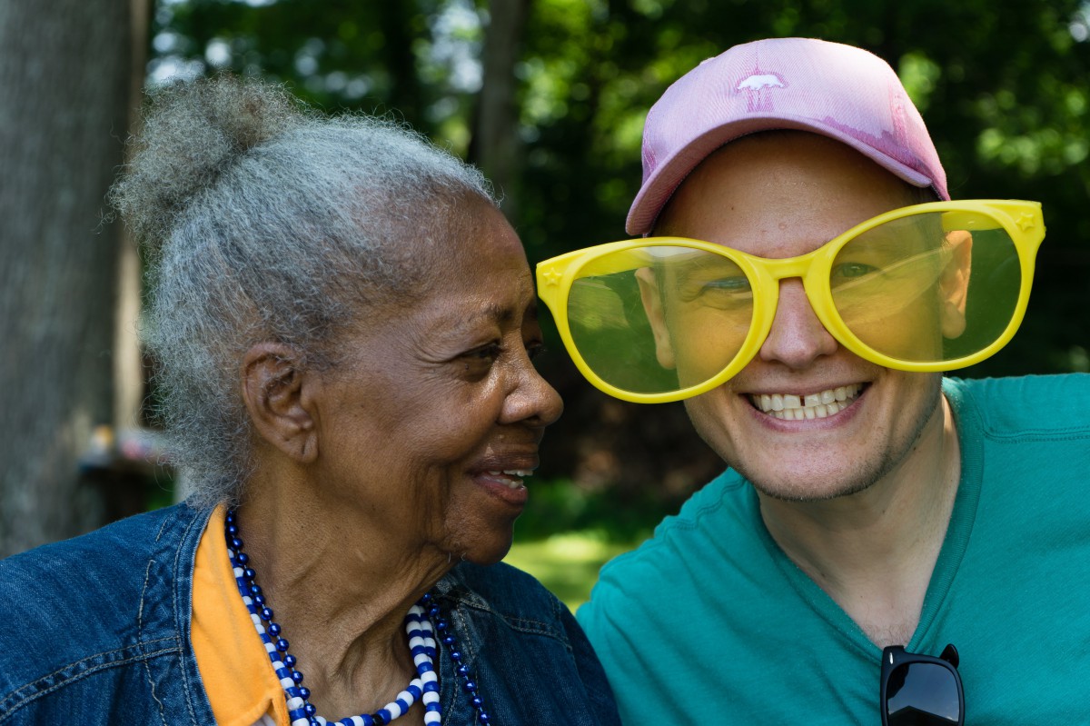 Two friends enjoying a sunny day, sharing laughter and joy.