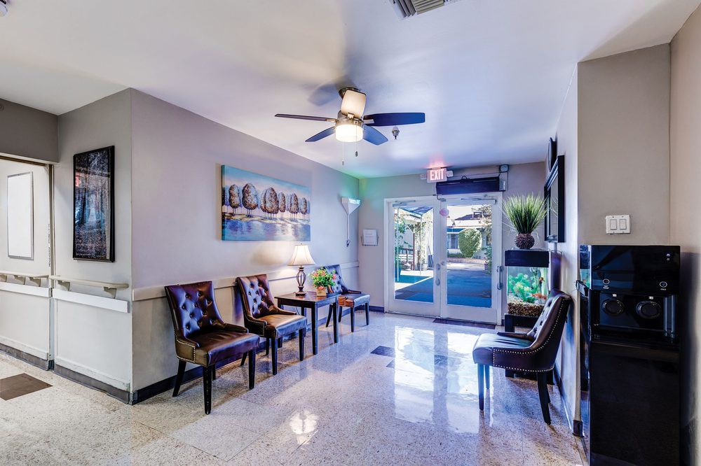 A modern lobby area with comfortable seating and bright lighting.