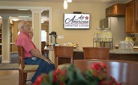 A community space at All American Assisted Living, featuring comfortable seating and refreshments.