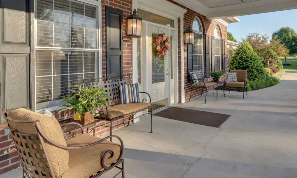 A welcoming front porch with comfortable seating and decorative elements.