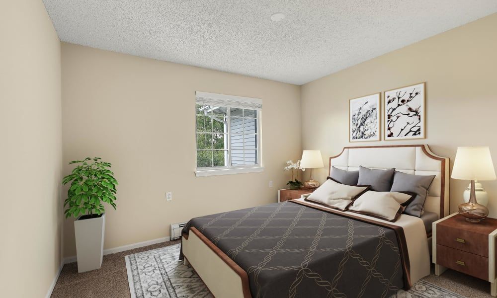 A cozy and well-decorated bedroom featuring neutral tones, modern artwork, and a touch of greenery.