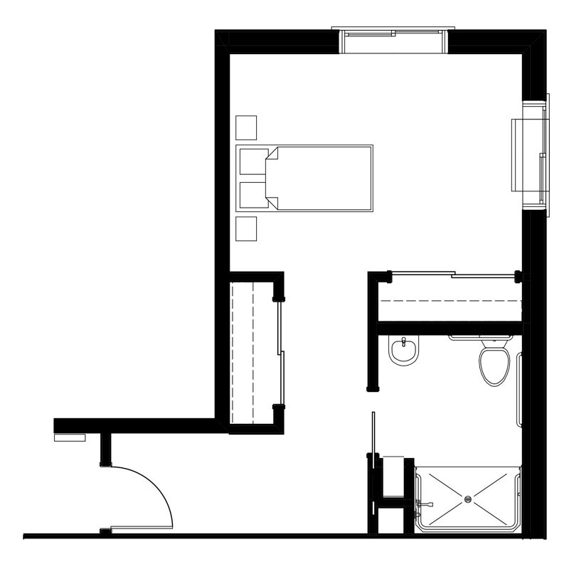 Compact apartment floor plan showing living area, kitchen, and bathroom.