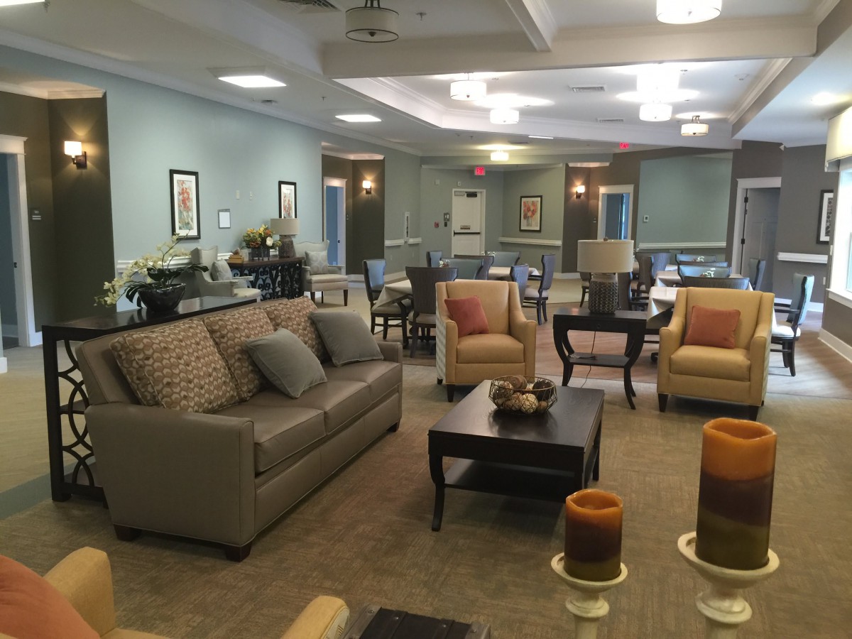 A cozy and elegant living room with modern furniture and decor.