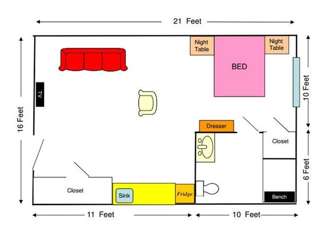 A floor plan illustrating the layout of a room with labeled furniture including a bed, dresser, night tables, sofa, and other features.
