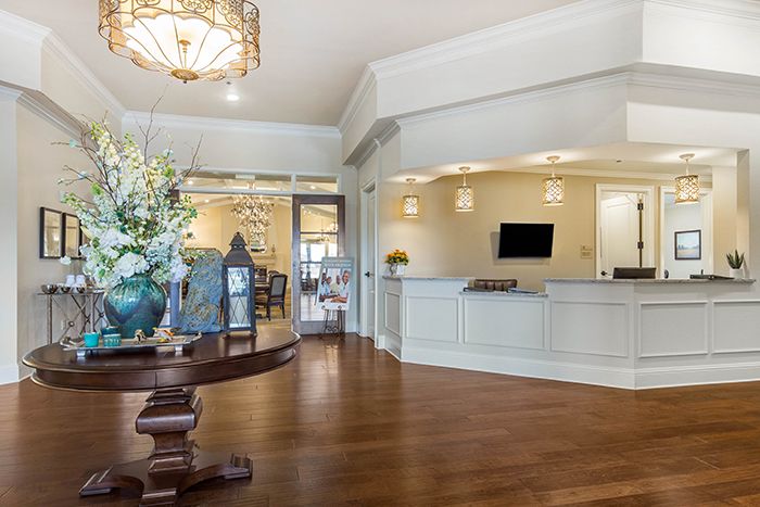 A welcoming lobby area with a reception desk and elegant decor.