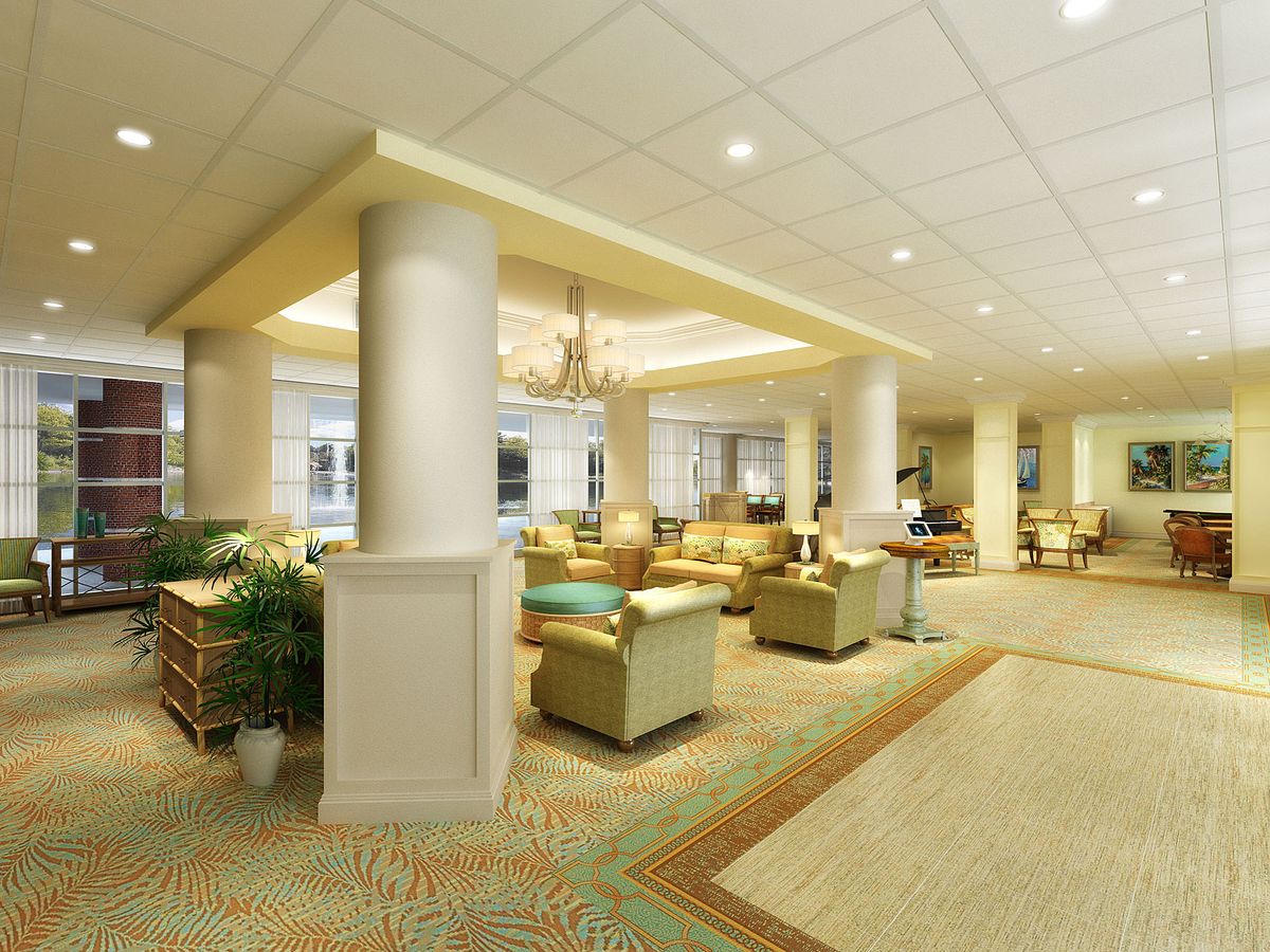A spacious and elegantly designed lobby with comfortable seating and ambient lighting.
