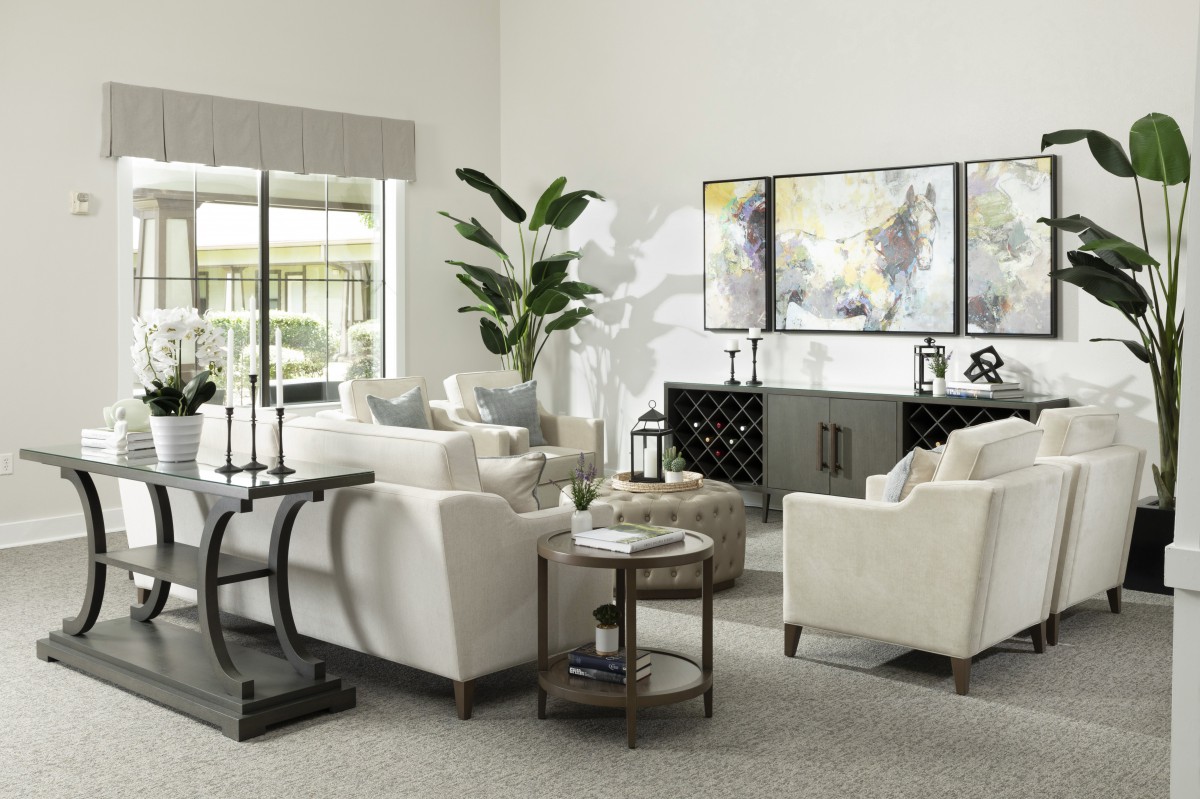 A modern living room with stylish furniture and contemporary artwork.