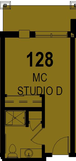 A door sign indicating room 128, labeled as MC Studio D.