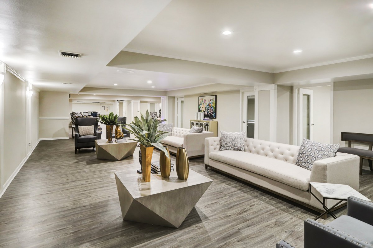 A modern lobby area with stylish furniture and decor.