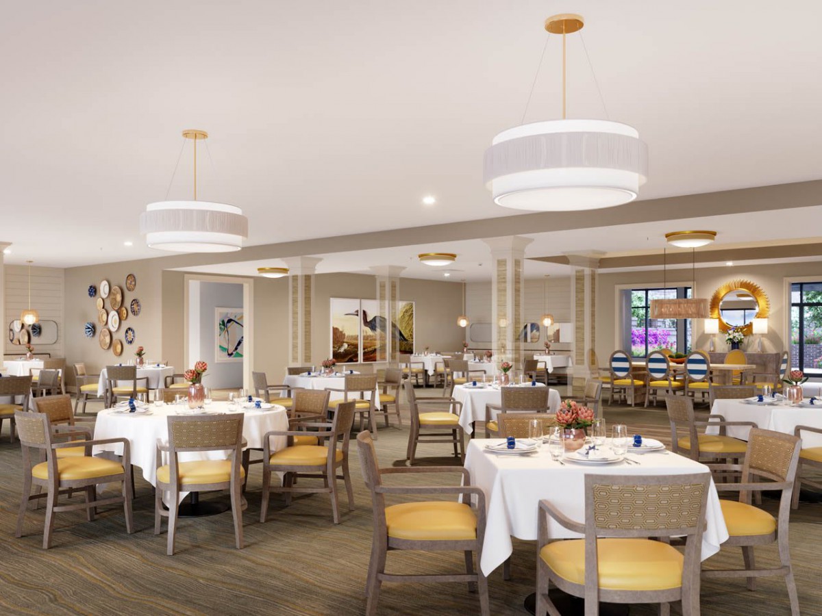 A modern dining area with elegantly arranged tables and soft lighting.