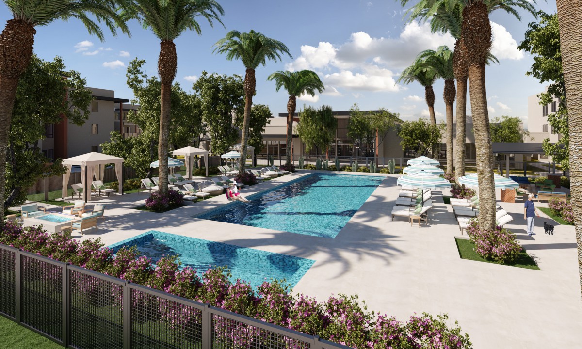 A luxurious outdoor swimming pool surrounded by palm trees and sun loungers, perfect for a relaxing vacation day.
