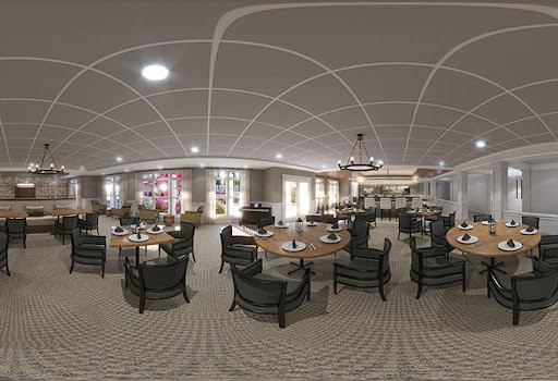 A spacious and elegantly designed dining area with modern furniture, perfect for gatherings or intimate meals.
