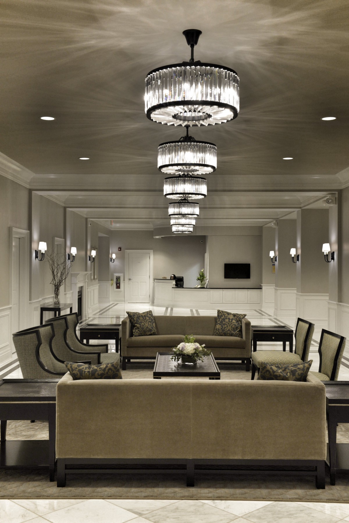 A luxurious and modern lobby with elegant lighting and comfortable seating.