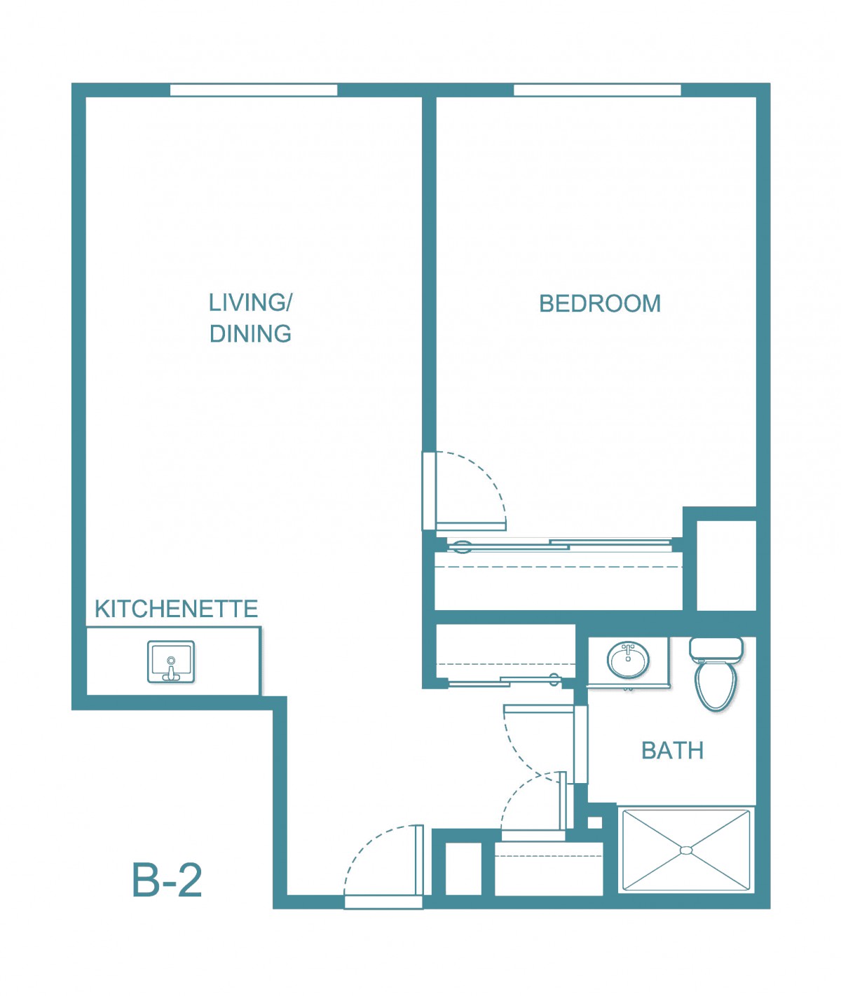 A floor plan of a one-bedroom apartment featuring a combined kitchen and living area, bathroom, and bedroom.