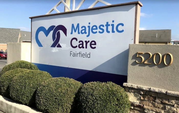Outdoor signage of Majestic Care Fairfield healthcare facility.