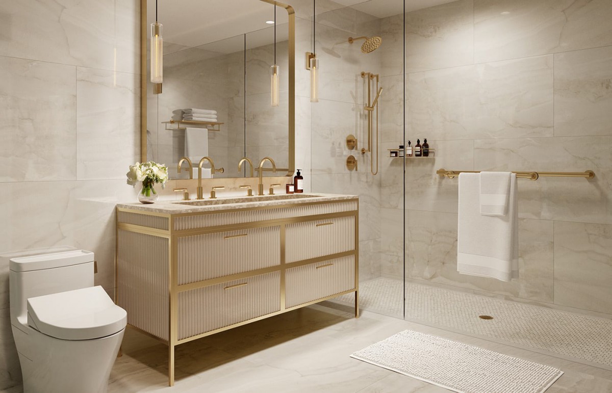 A luxurious modern bathroom with gold accents and a glass shower enclosure.