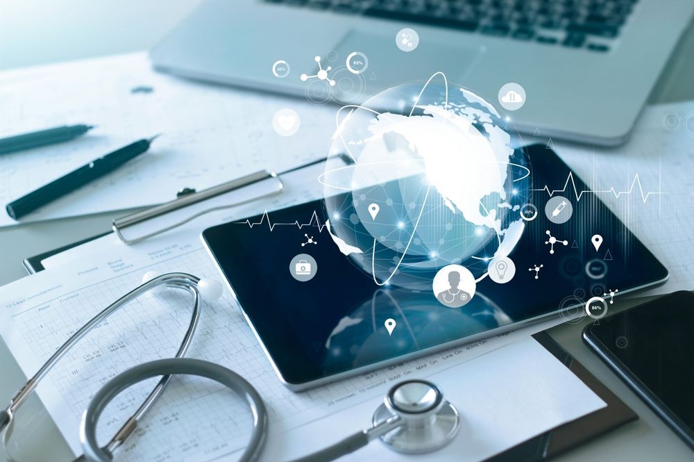 A digital representation of global healthcare innovation with a tablet and stethoscope.