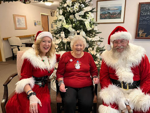 A joyful Christmas celebration with Santa and friends.