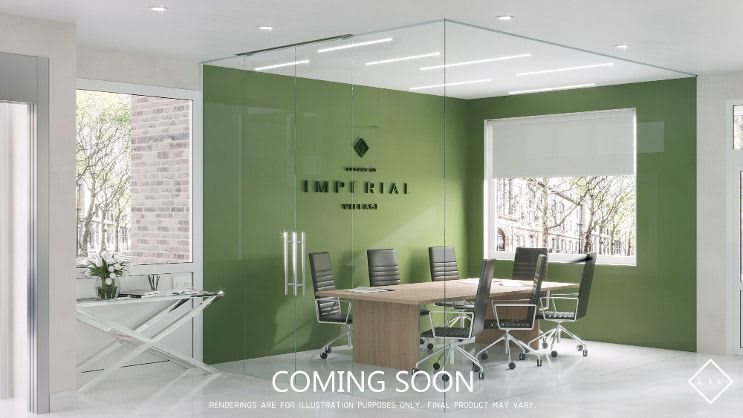 A modern conference room with a green accent wall and 'Coming Soon' text.