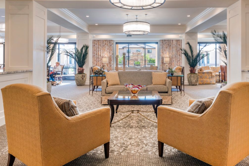 A luxurious hotel lobby with elegant seating and decor.