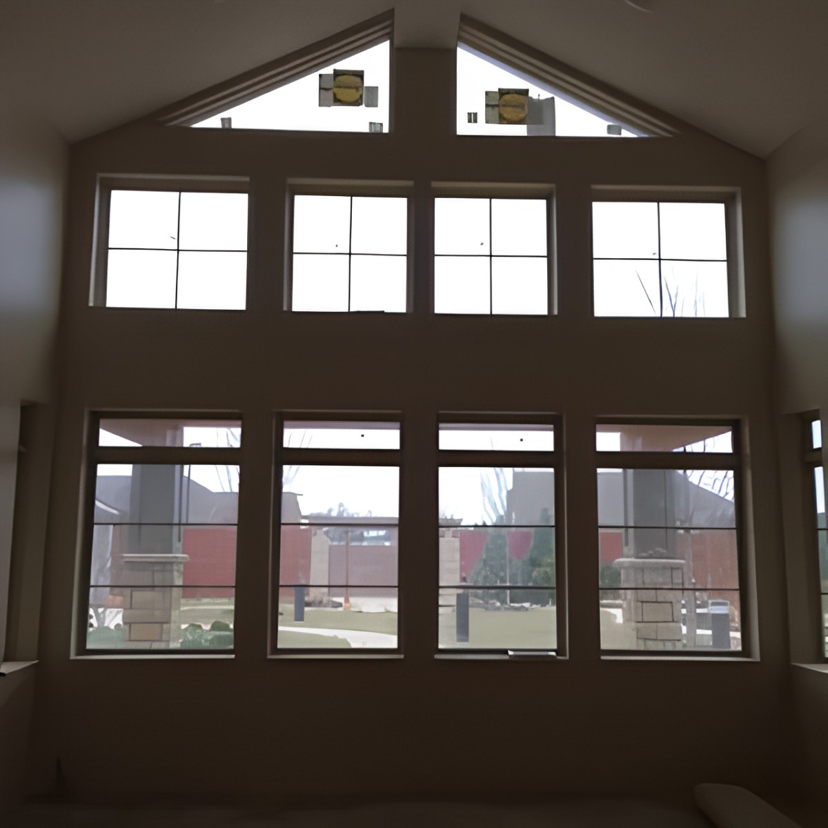 Interior view of a large set of windows, showcasing architectural design.