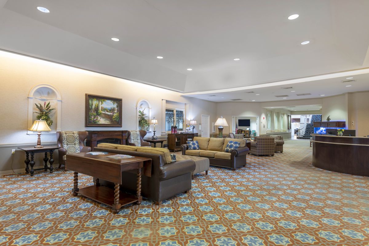 A spacious lobby area with comfortable seating and elegant decor.