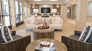 A modern living room with stylish furniture and decor.