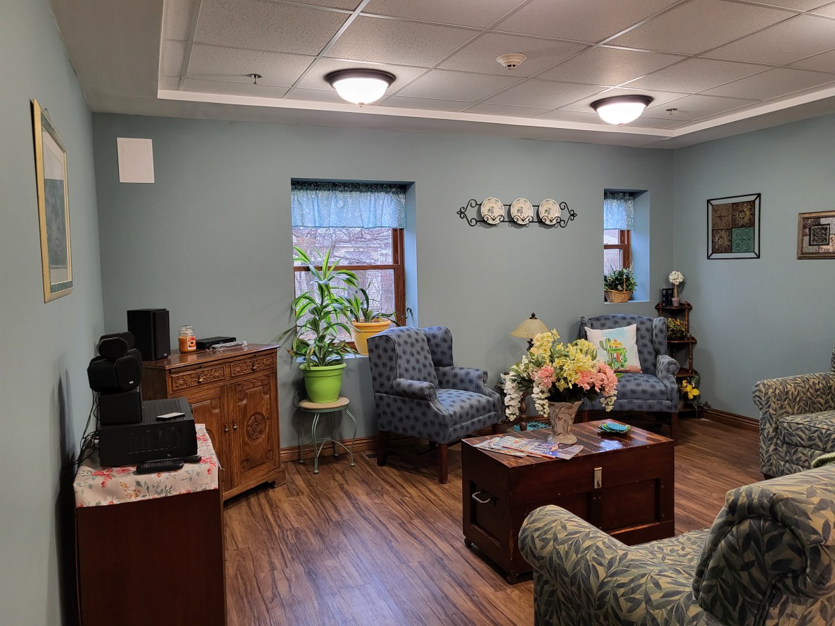 A cozy living room with comfortable furniture and decor.