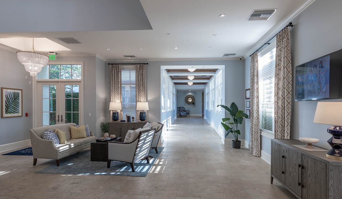 A modern lobby area with comfortable seating and ample natural light.