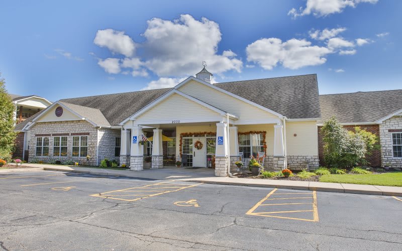 A building with a welcoming entrance and a clear sky above.