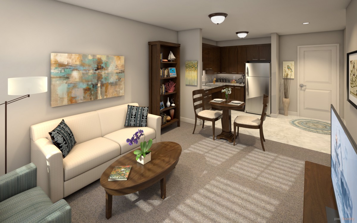 A cozy living and dining area with modern furnishings and neutral tones.