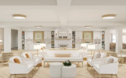A luxurious and modern living room with a white color scheme, featuring elegant furniture and stylish lighting.