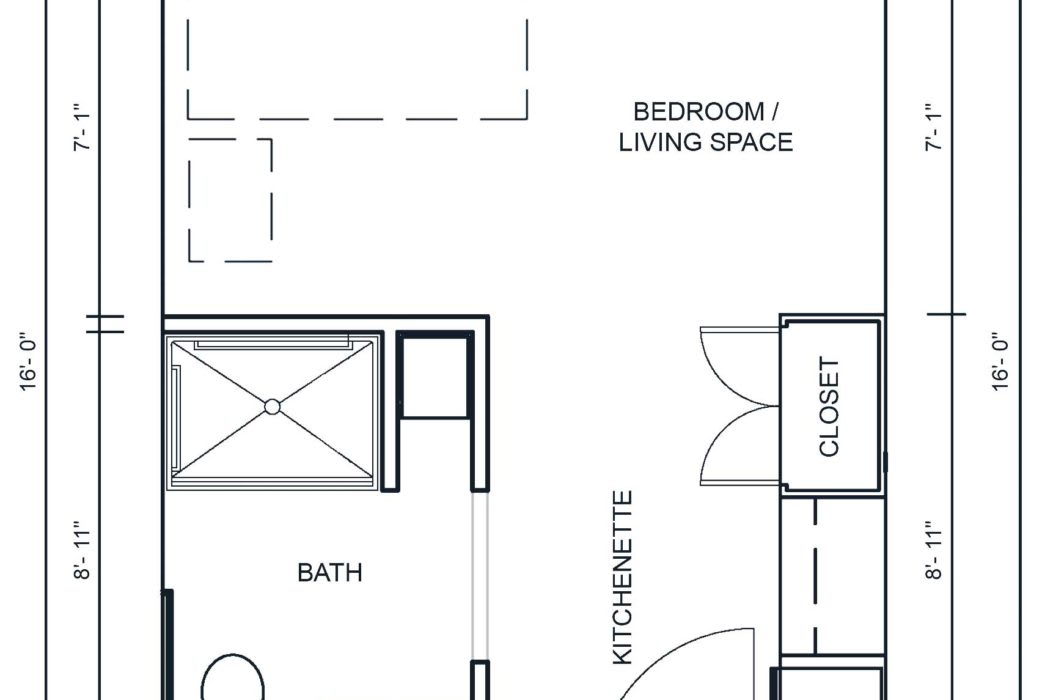 Studio apartment floor plan with a bath, kitchenette, and living area.