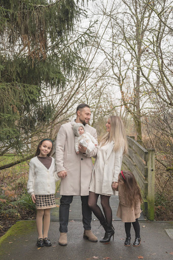 A beautiful family moment captured in nature, embracing the joy of togetherness.