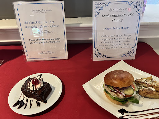 A delightful display of a chocolate dessert and a burger, accompanied by menu descriptions.