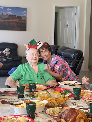 A joyful holiday gathering with loved ones, enjoying festive treats and creating cherished memories.