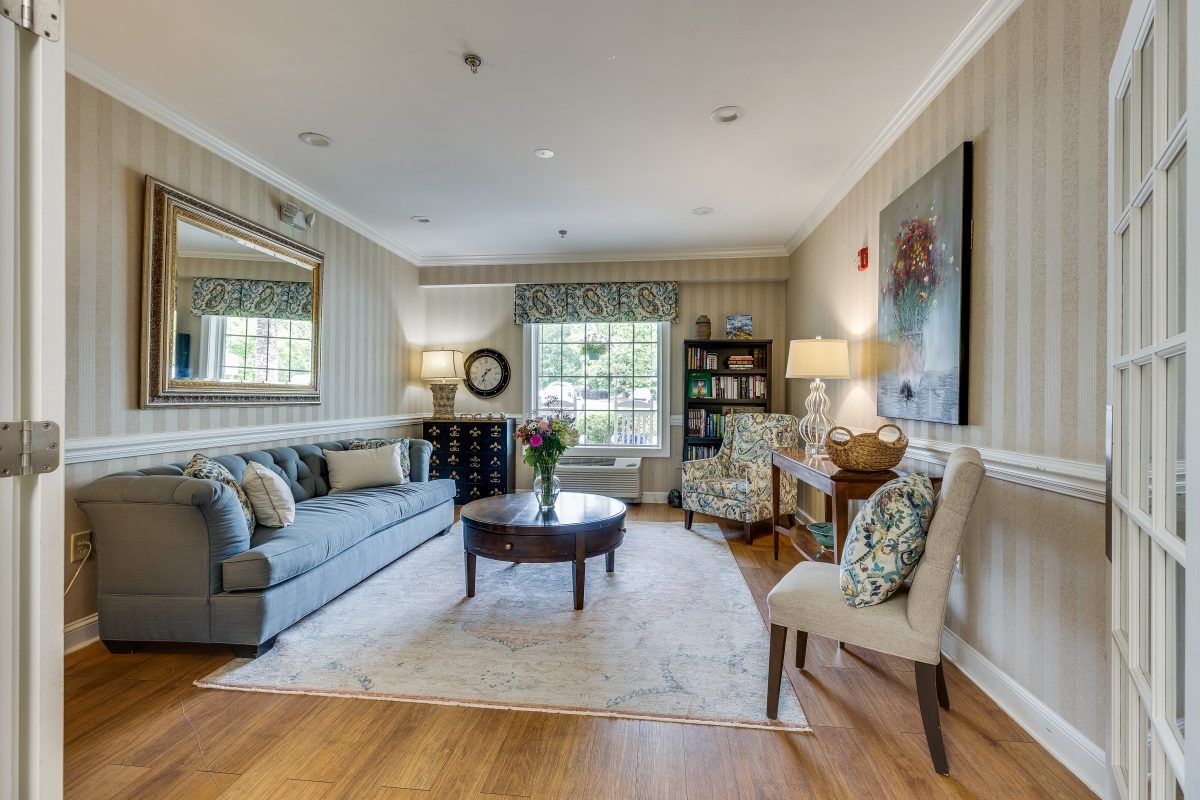 A cozy and elegantly decorated living room with comfortable seating and stylish decor.